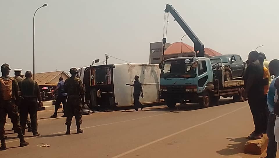 A breakdown towing away the damaged vehicles