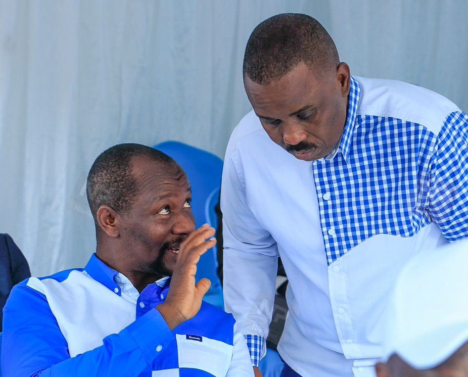 Ibrahim Semujju sharing ideas with Erias Lukwago at the Katonga FDC Delegates Conference e1724149684