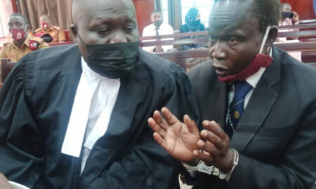 Lawyer Caleb Alaka together with the accused Thomas Kwoyelo