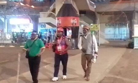 Mr. Andrew Irumba Dr. Wakawaka and Bishop Joshua Maponga at Entebbe International Airport scaled e17