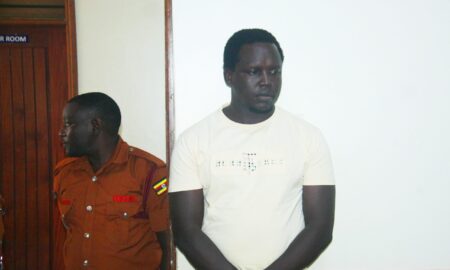 Rev Fr. Dominic Alinga freezing in court dock scaled