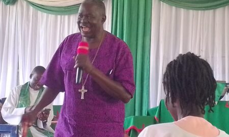 Rt. Rev. George William Erwau advising youth at St. Peters Cathedral on Sunday. Photo by Emmanuel Op