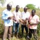 Agric Officer Opolot Mid engaging with Farmers Photo By George Emuron e1726144589620