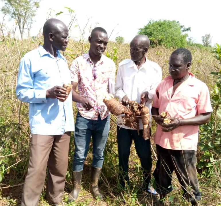 Agric Officer Opolot Mid engaging with Farmers Photo By George Emuron e1726144589620