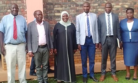 Hajat Zaminah Malole in a group photo with Entebbe security committee scaled e1725972252223