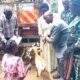 Ms Akello handing over goats to beneficiary Photo By George Emuron 1 e1726043754393